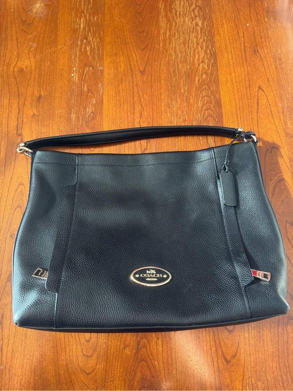 Coach Scout Black Pebbled Leather Shoulder Bag with Gold Accents